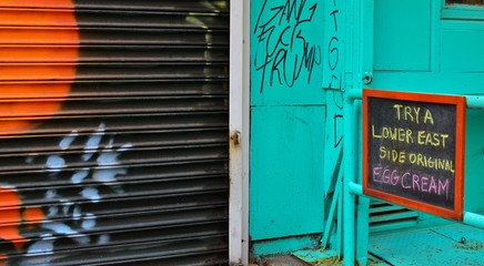 Lower East Side NYC Graffiti Grunge Style Street Restaurant Sign