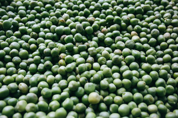 Fresh green peas background. Vegetarian healthy food texture. Vegetables low fat diet.