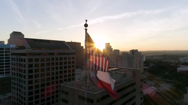 4K Aerial Texas Flag American Flag at Sunset Austin