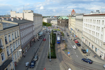 An intersection with an old tram and cars. Poznań, Poland © Agata