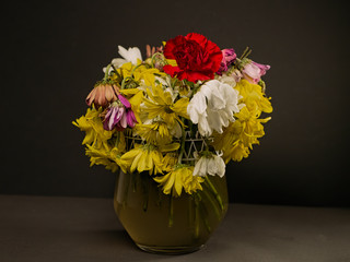 faded bouquet in a vase