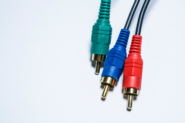 Multimedia multi-colored cables. Or tulips adapters for audiodevices. On a white background. The...