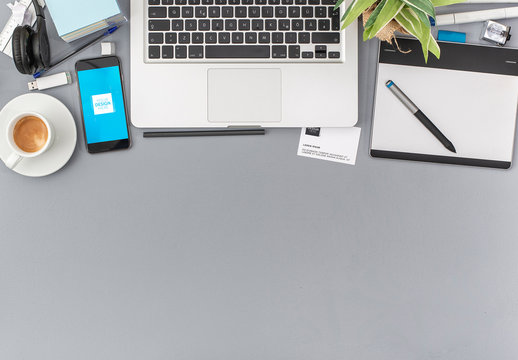 Desk with Laptop and Smartphone Mockup