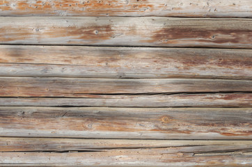 Obraz premium Old cracked wooden logs background