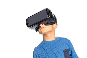 virtual reality goggles on young boy white background