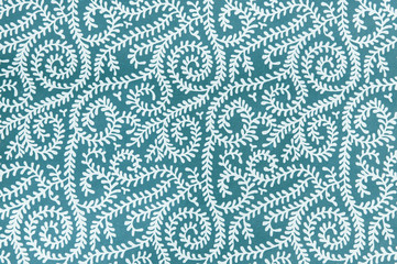 Background texture of white vines on cool blue