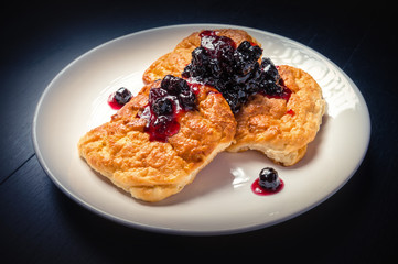 cheese cake with jam on dark