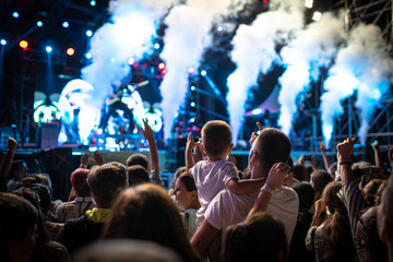 Concert crowds with adults and children