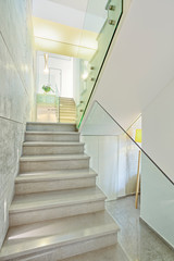 View of  marble stairs in modern house- Home Styling