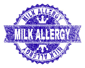MILK ALLERGY rosette stamp seal watermark with distress effect. Designed with round rosette, ribbon and small crowns. Blue vector rubber watermark of MILK ALLERGY label with unclean style.