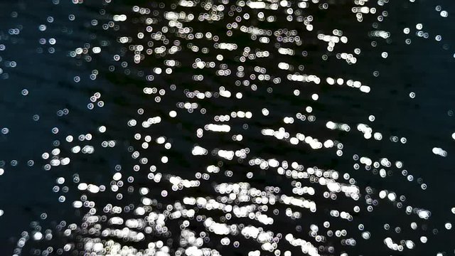 Artistic illusory virtual spot light, progressive moving water ripple