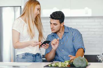 couple at home in a kitchen
