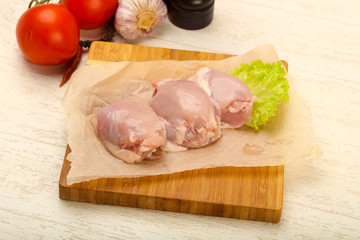 Boneless raw chicken thighs