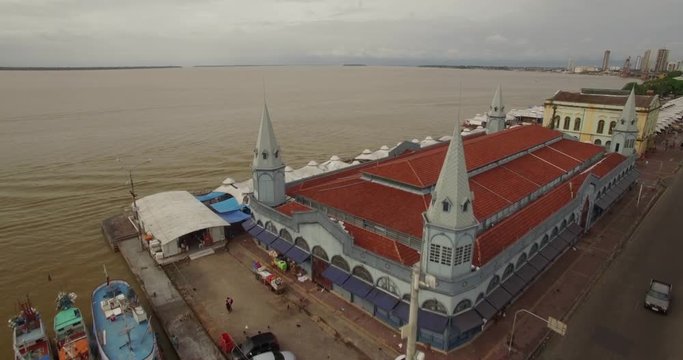 Aerial passing the historic Ver-o-Peso market in old port town of Belem do Para in the Brazilian Amazon revealing the river in the background