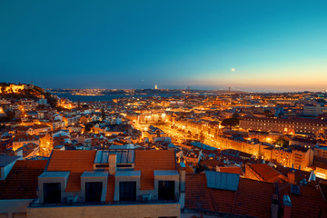 Lisbon lighted city at sunset blue hour