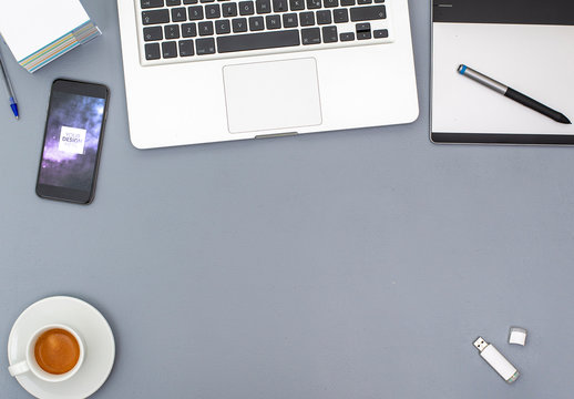 Desk with Laptop and Smartphone Mockup