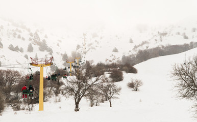 tourist observation cable car in the misty mountains