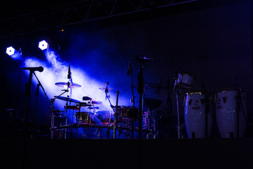 drums on stage and lights