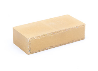 Image of a single yellow brick on white background