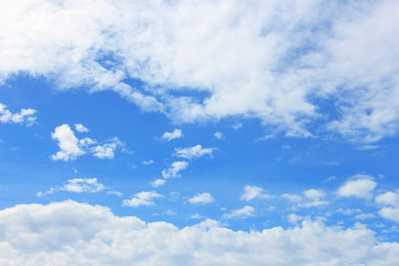 Naklejka na ściany i meble Tiny cloud with sky background