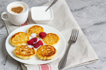White Cup of Coffee Cappuccino with Heart Pattern of Cinnamon, Cottage Cheese Pancakes with Raspberries, Healthy Breakfast, Traditional Food, Valentines Day