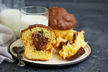 Brioche bun with chocolate filling and chocolate coating.