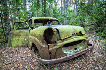 Old car on cemetery in Ryd