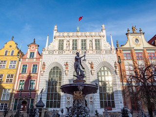 Gdansk, Poland, old town, Statue of Neptune, symbol of Gdansk, with Artus Court in the back and...