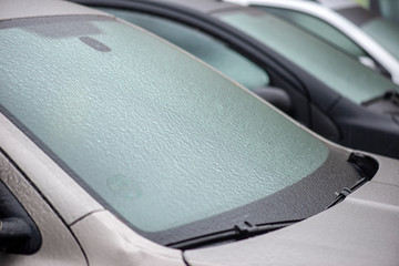 Cars covered with ice after freezing rain