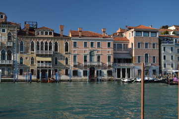 Fototapeta na wymiar Picturesque And Colorful Palaces On The Grand Canal In Venice. Travel, holidays, architecture. March 28, 2015. Venice, Veneto region, Italy.