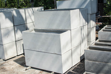 Rectangular  concrete pots for plants  in store