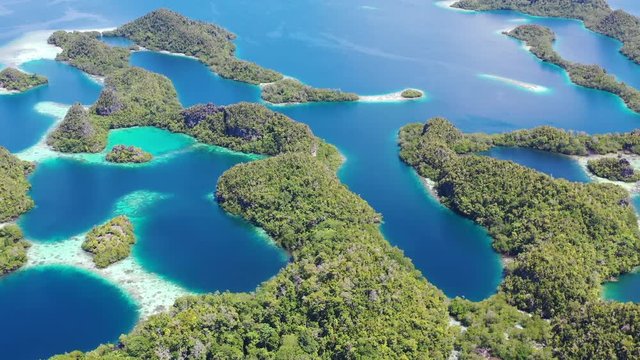 Aerial View of Gorgeous Tropical Islands and Reefs in Pef, Raja Ampat