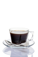 Black coffeein a glass cup on a white background.