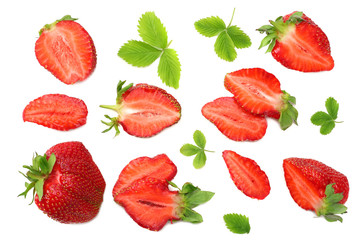 Strawberry with green leaf and slices isolated on white background. top view