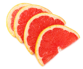 sliced grapefruit isolated on white background. top view