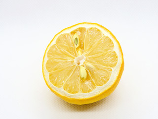 Withered and half cul lemon on white background