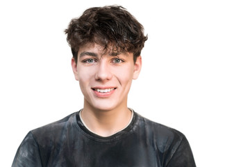 Portrait of a cute boy adolescent on a white background. The guy smiles and is very happy because he has found a new friend