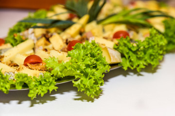 Cheese plate served on the table