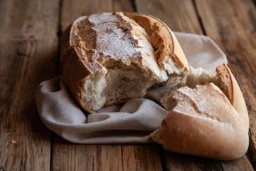 Fresh bread on the wooden table rustic