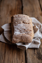 Fresh bread on the wooden table rustic