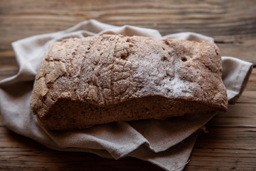 Fresh bread on the wooden table rustic