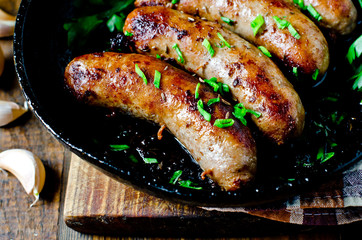 Homemade sausages from turkey (chicken) fried in a frying pan