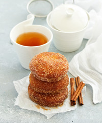Donuts with cinnamon and chocolate cream. Homemade baking. Selective focus.