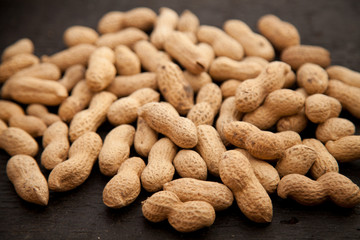 Peanut isolated on the wooden desk