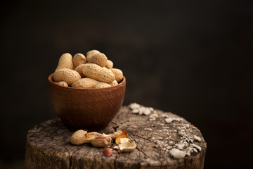 Peanut isolated on the wooden desk
