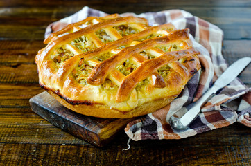 Pie with cabbage and vegetables