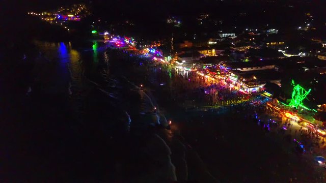 AERIAL, Haad Rin Beach at night on Full Moon Party in Koh Phangan island, Thailand 