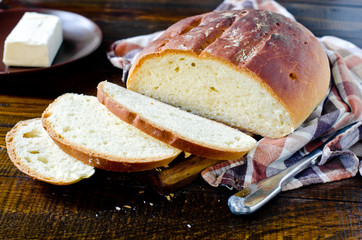 Homemade bread on a dark wooden background