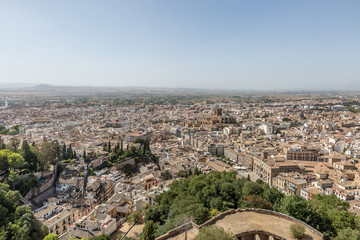Fototapeta na wymiar Cityscape of Granada. Granada is a popular destination among the tourist cities of Spain, mainly because of Alhambra palace complex, which is part of UNESCO World Heritage.