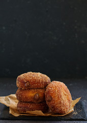 Donuts with cinnamon and chocolate cream. Homemade baking. Selective focus.